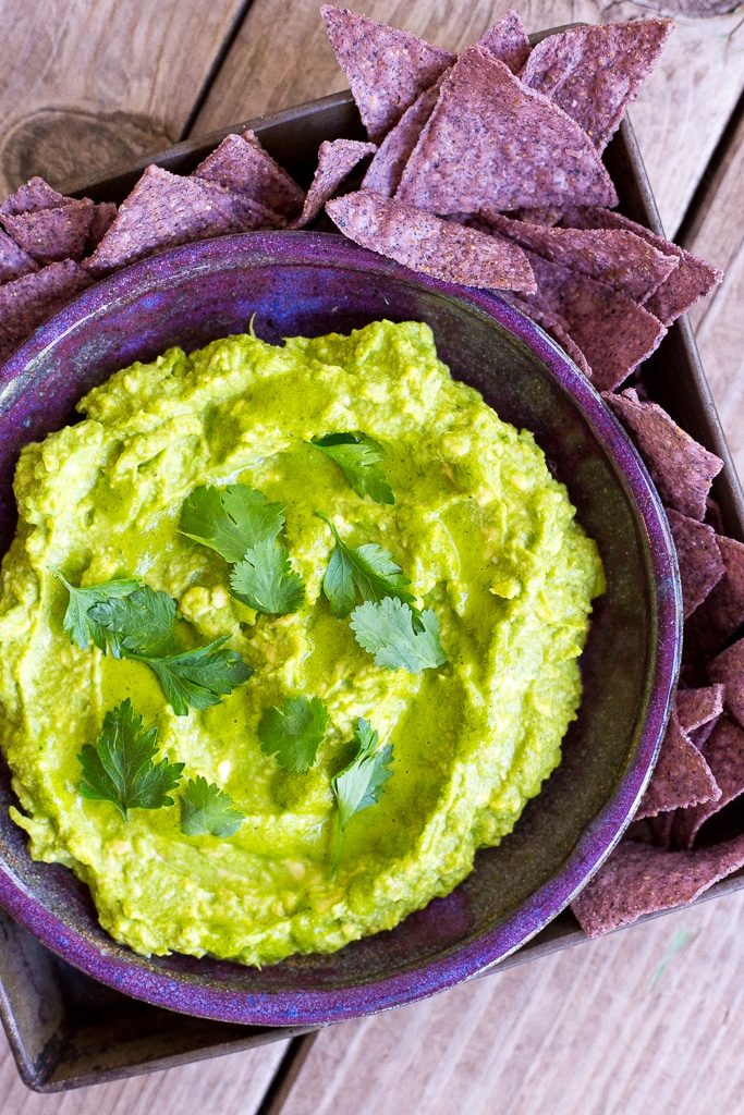 This Chimichurri Guacamole is packed with so much delicious flavor! It's perfect for an appetizer, dip or just to top your favorite food with!