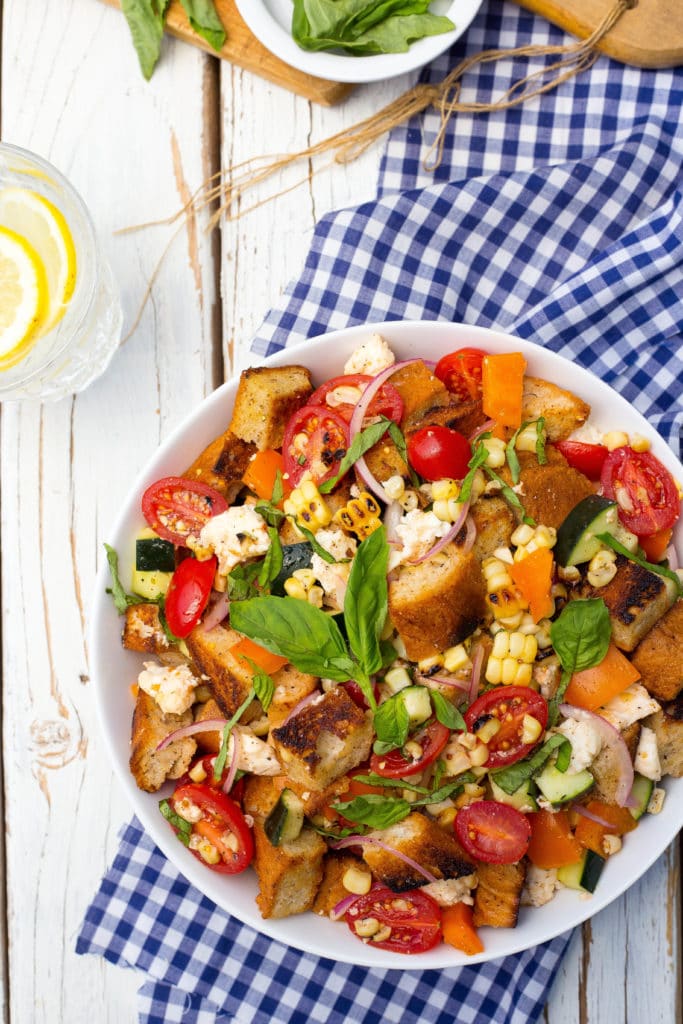 Grilled Corn Summer Panzanella Salad! You will get a delicious taste of summer in every bite! This is the perfect side dish for a BBQ or light lunch!