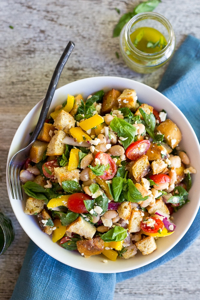 This Spinach and White Bean Panzanella Salad with Basil Vinaigrette is fresh, filling and delicious! It's the perfect meal for lunch that can also be made ahead! {gluten free}
