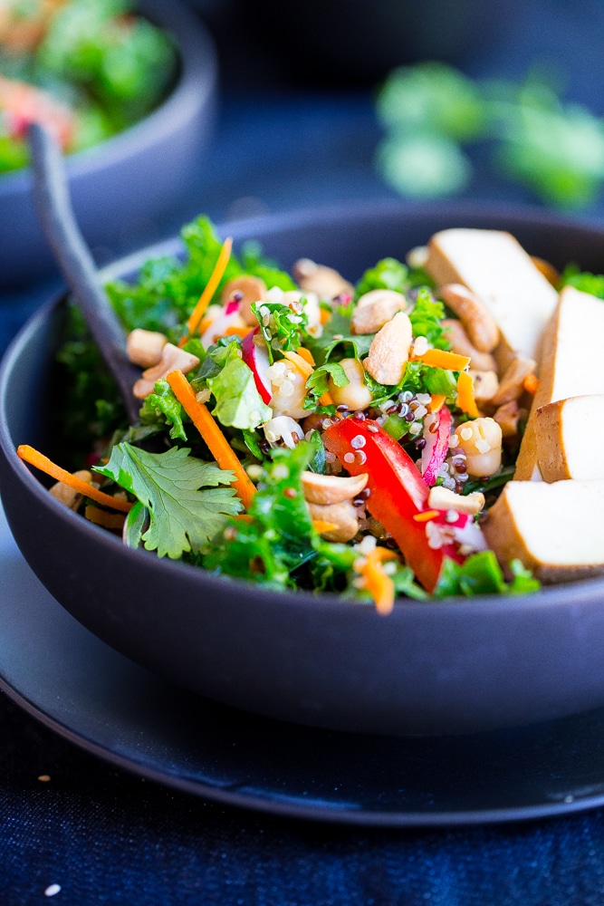 This Asian Kale Power Salad is packed with protein, flavor and crunch to keep you feeling full all afteroon! Perfect for lunch! Gluten free and vegan too!