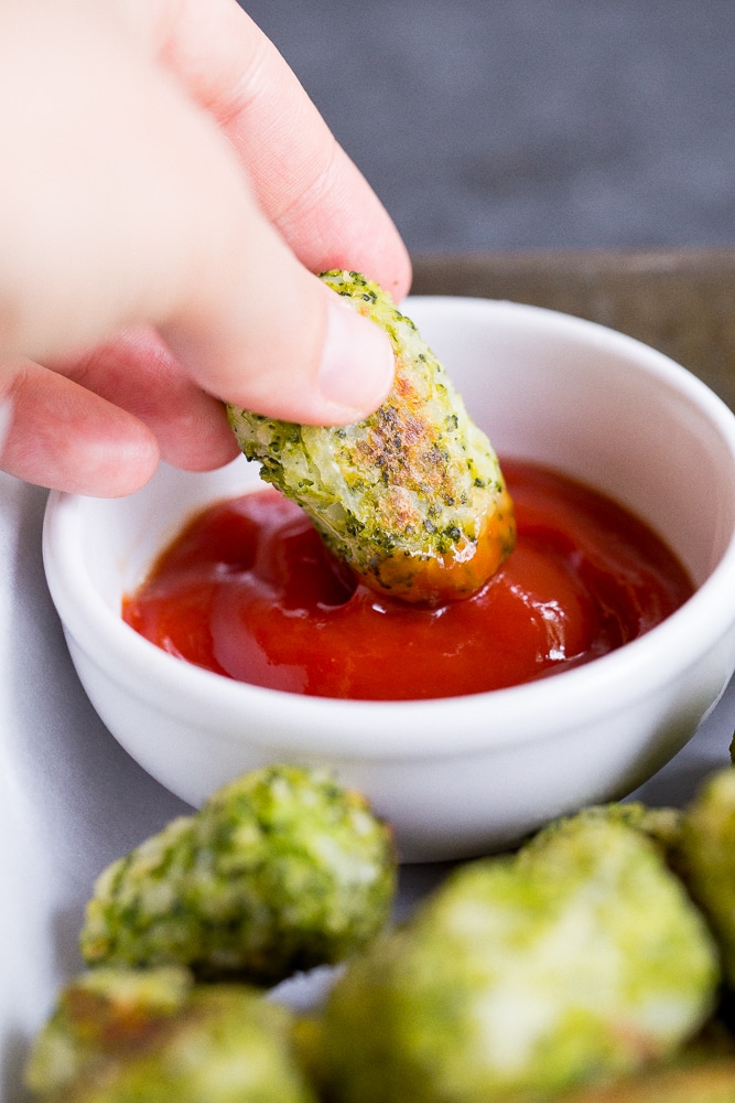 These 4 Ingredient Broccoli Tater Tots are packed with tons of broccoli and baked in the oven making them a really healthy side dish or snack! A perfect way to get some extra veggies into your life! Vegan and gluten free!