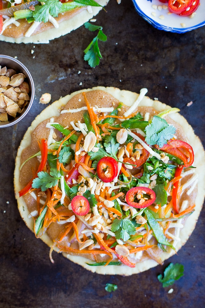 These Easy Thai Vegetable Pita Pizzas only take 30 minutes to make and are great for a delicious vegetarian weeknight dinner! Gluten free and vegan option too!