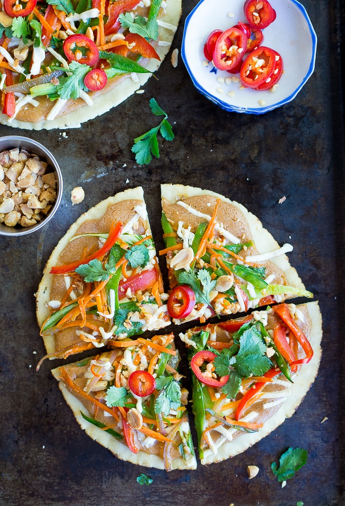 These Easy Thai Vegetable Pita Pizzas only take 30 minutes to make and are great for a delicious vegetarian weeknight dinner! Gluten free and vegan option too!