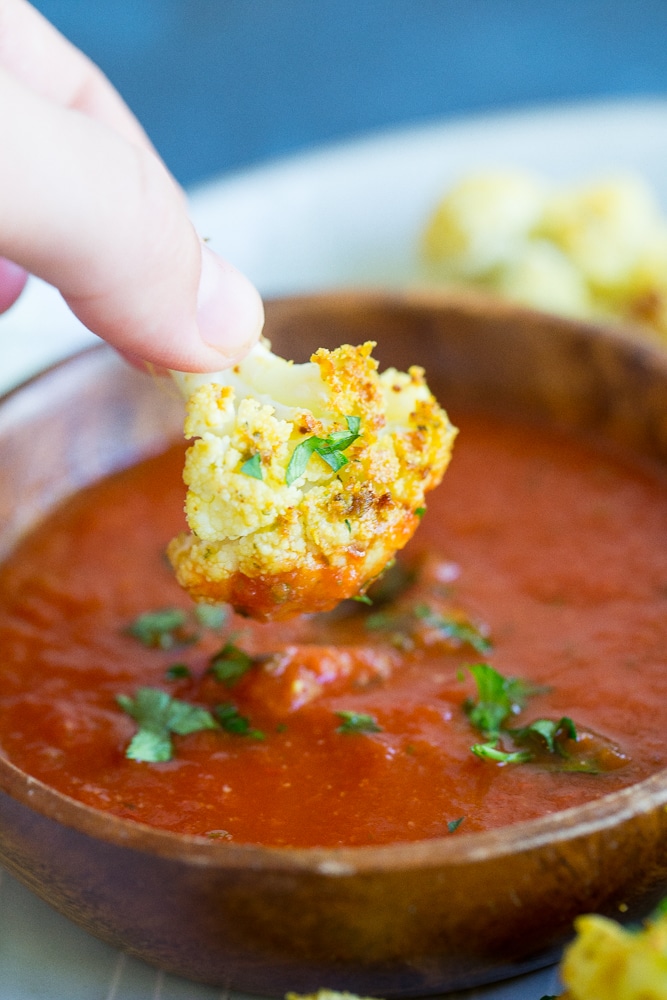 Baked Cauliflower Pizza Bites- These would be a great healthy afternoon snack or the perfect side dish for dinner! Make them as a healthier option to go with your next pizza night! Gluten free and vegan!