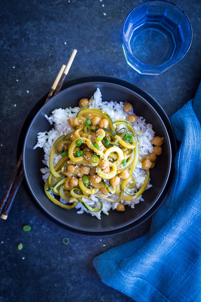  These 30 Minute Orange Ginger Zucchini Noodle Chickpea Bowls are great for a quick and easy vegetarian (and vegan) weeknight dinner! They're also perfect for a healthy make ahead lunch bowl! Gluten free too!