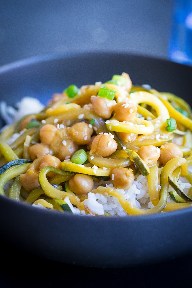  These 30 Minute Orange Ginger Zucchini Noodle Chickpea Bowls are great for a quick and easy vegetarian (and vegan) weeknight dinner! They're also perfect for a healthy make ahead lunch bowl! Gluten free too!