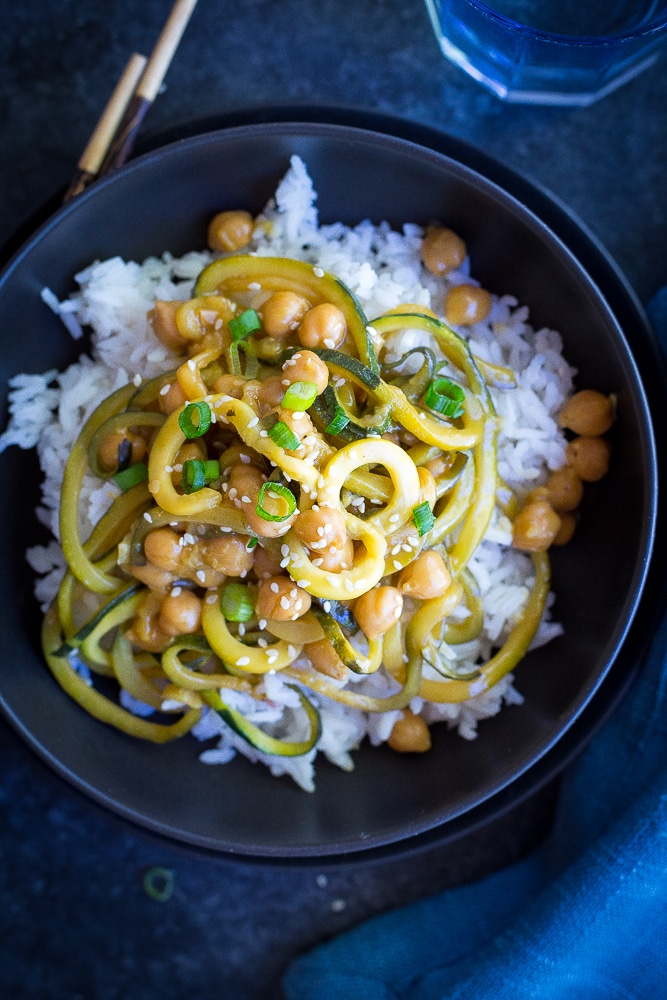  These 30 Minute Orange Ginger Zucchini Noodle Chickpea Bowls are great for a quick and easy vegetarian (and vegan) weeknight dinner! They're also perfect for a healthy make ahead lunch bowl! Gluten free too!