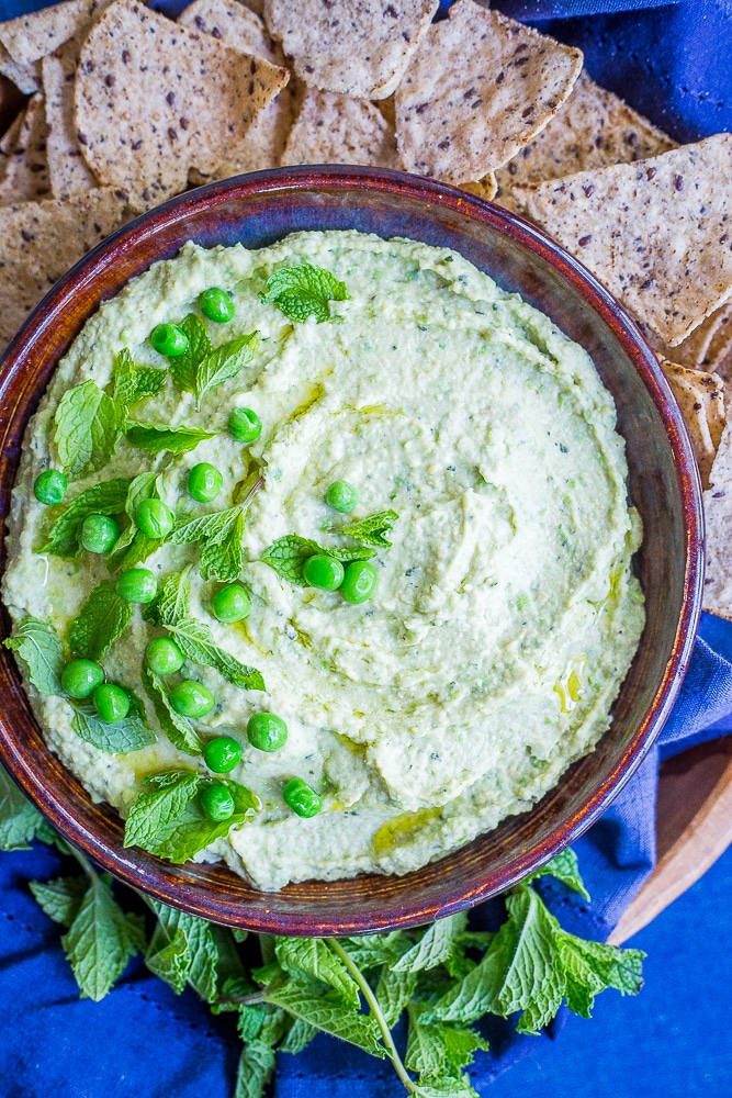 Minty Sweet Pea Hummus - A fresh and flavorful twist on the classic! Great for a healthy appetizer, snack or to put on sandwiches and salads! Gluten free, vegan, healthy