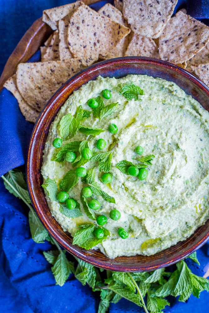 Minty Sweet Pea Hummus - A fresh and flavorful twist on the classic! Great for a healthy appetizer, snack or to put on sandwiches and salads! Gluten free, vegan, healthy