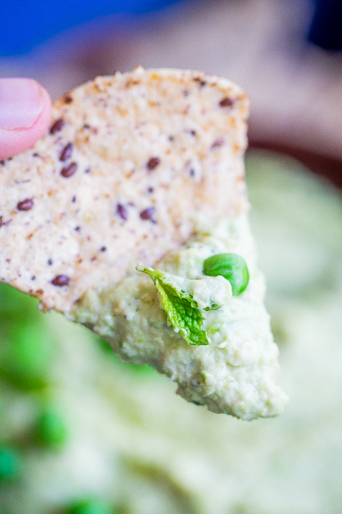 Minty Sweet Pea Hummus - A fresh and flavorful twist on the classic! Great for a healthy appetizer, snack or to put on sandwiches and salads! Gluten free, vegan, healthy