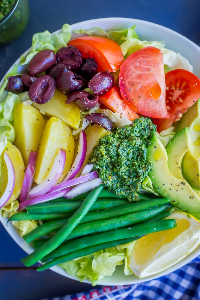 Avocado Nicoise Salad with Pesto - A delicious and refreshing vegan version of the classic nicoise salad! Filled with tons of veggies making it a healthy lunch or side dish. Vegan/Gluten Free/Vegetarian