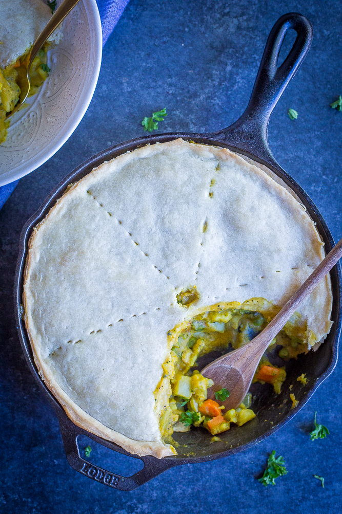 This Curried Vegetable Pot Pie is such a delicious and flavorful vegan comfort food dish! It's rich and decedent but also packed with veggies making it a healthier option! Great for dinner! #vegan #vegetarian #dinner #comfortfood #potpie
