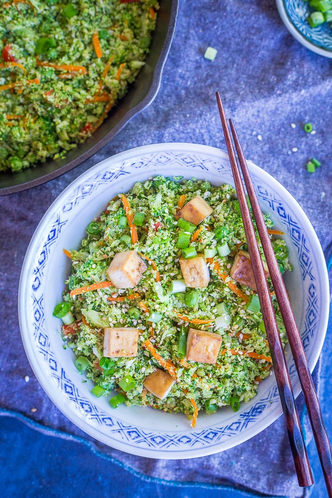 This Easy Broccoli Fried "Rice" comes together in only 30 minutes and is great as a side dish or main meal! Just add a little protein like tofu, tempeh or chickpeas and it's so filling! Vegan and gluten free too!