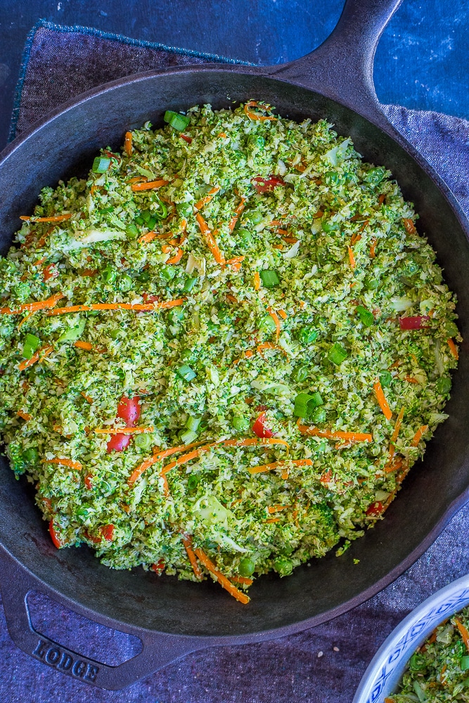 This Easy Broccoli Fried "Rice" comes together in only 30 minutes and is great as a side dish or main meal! Just add a little protein like tofu, tempeh or chickpeas and it's so filling! Vegan and gluten free too!