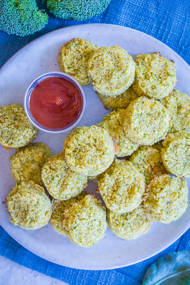 A big plate of Protein Packed Broccoli Cheese Bites with ketchup
