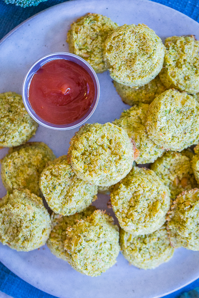 A big plate of Protein Packed Broccoli Cheese Bites with ketchup