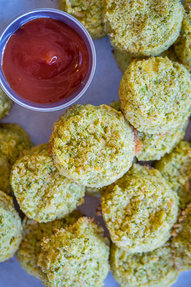 A close up of a plate of Protein Packed Broccoli Cheese Bites with ketchup