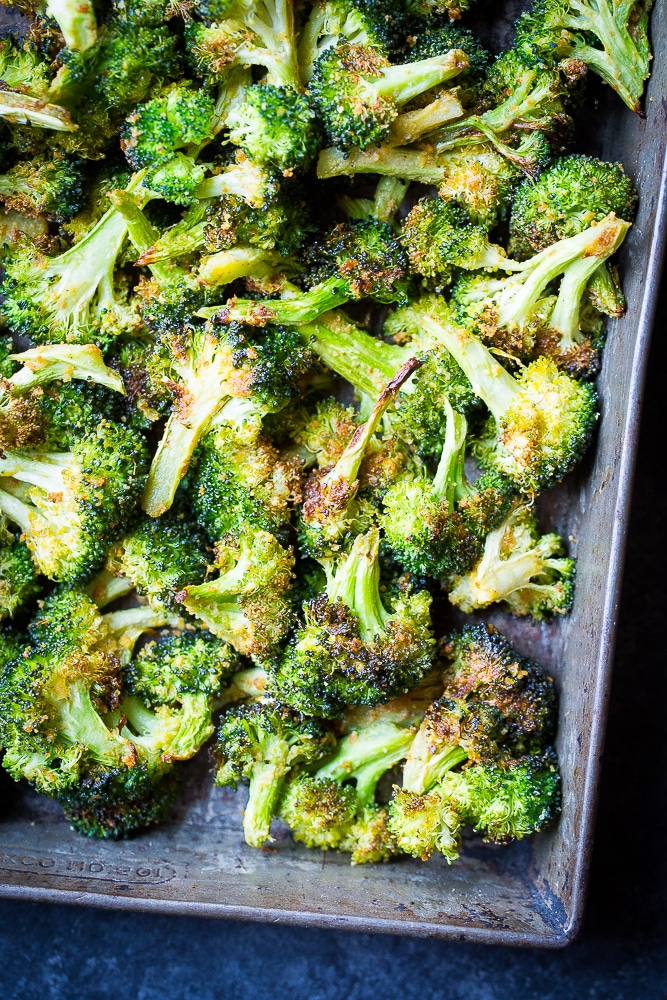 Tray of the best cheesy roasted broccoli with garlic