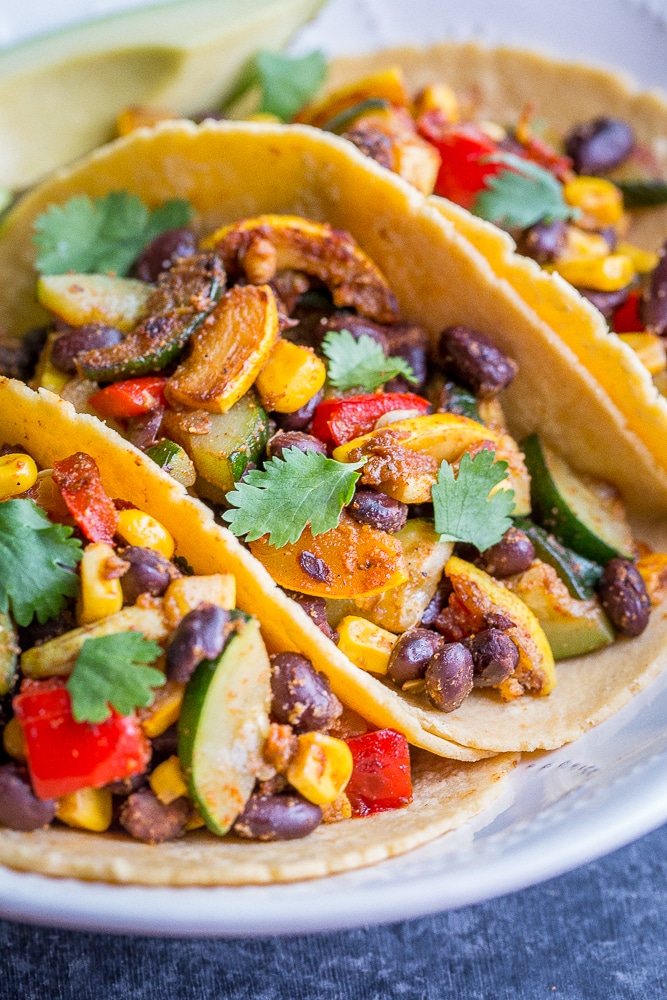Close up of Vegan Black Bean Tacos with summer vegetables