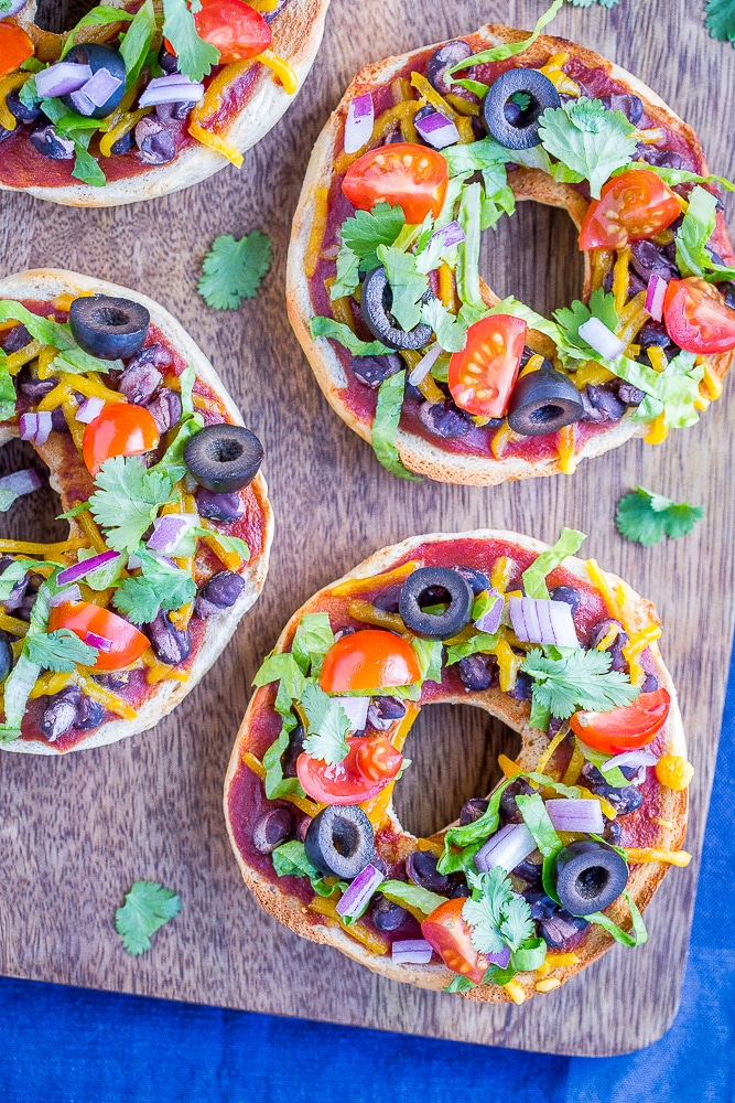 Taco Pizza Bagels on a cutting board