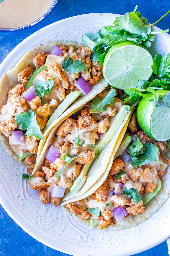 Vegan Tacos in a bowl with limes and cilantro