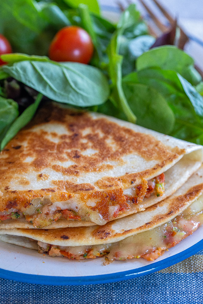 Close up of two sun-dried tomato quesadillas