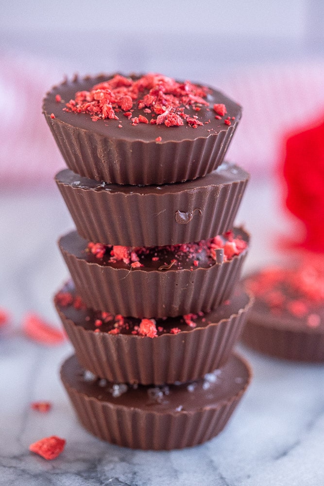 chocolate strawberry cups stacked on top of each other
