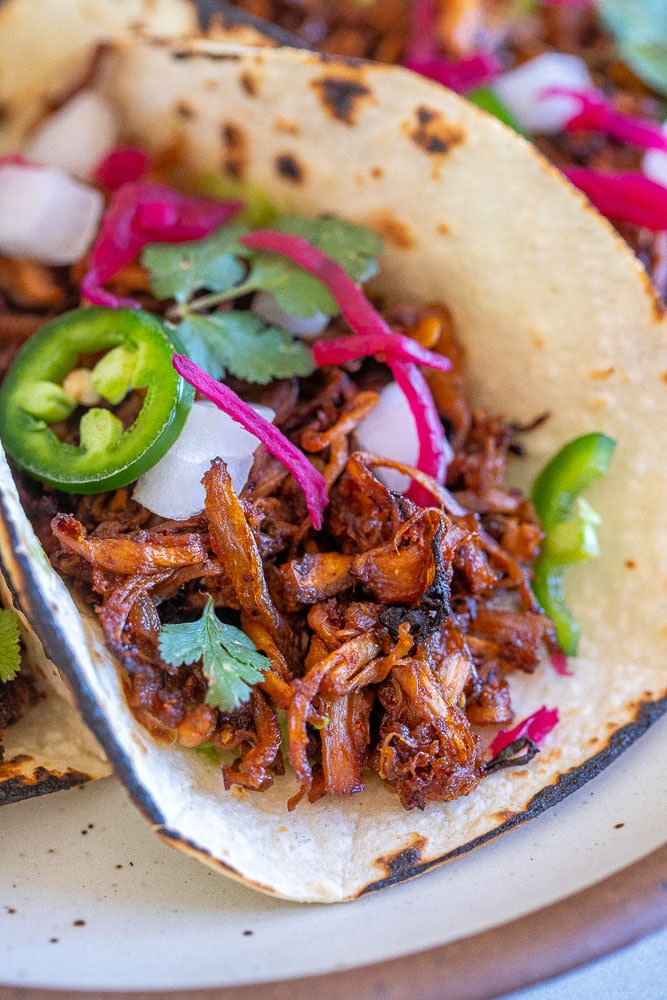 Close up of a vegan carnitas with mushroom tacos