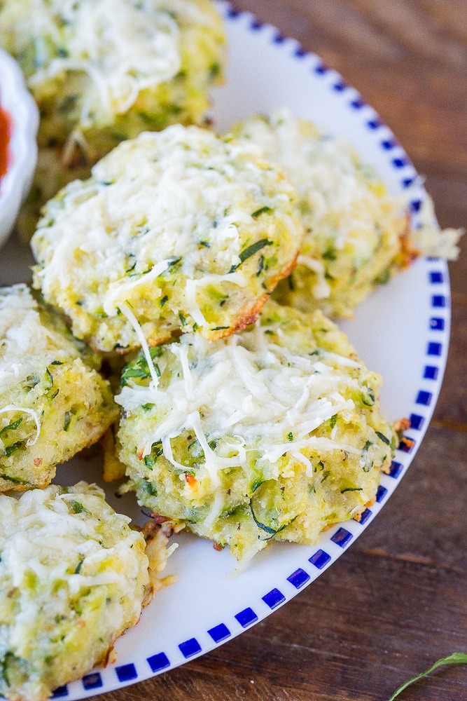 close up of a zucchini pizza bite on a plate