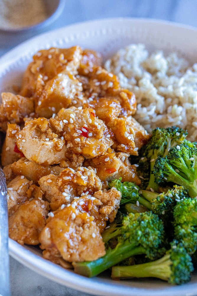 close up of sweet and spicy chili tofu in a bowl