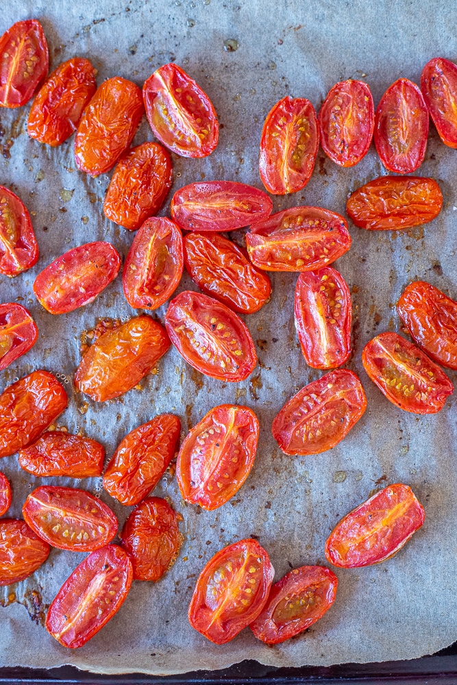 roasted tomatoes on a sheet pan