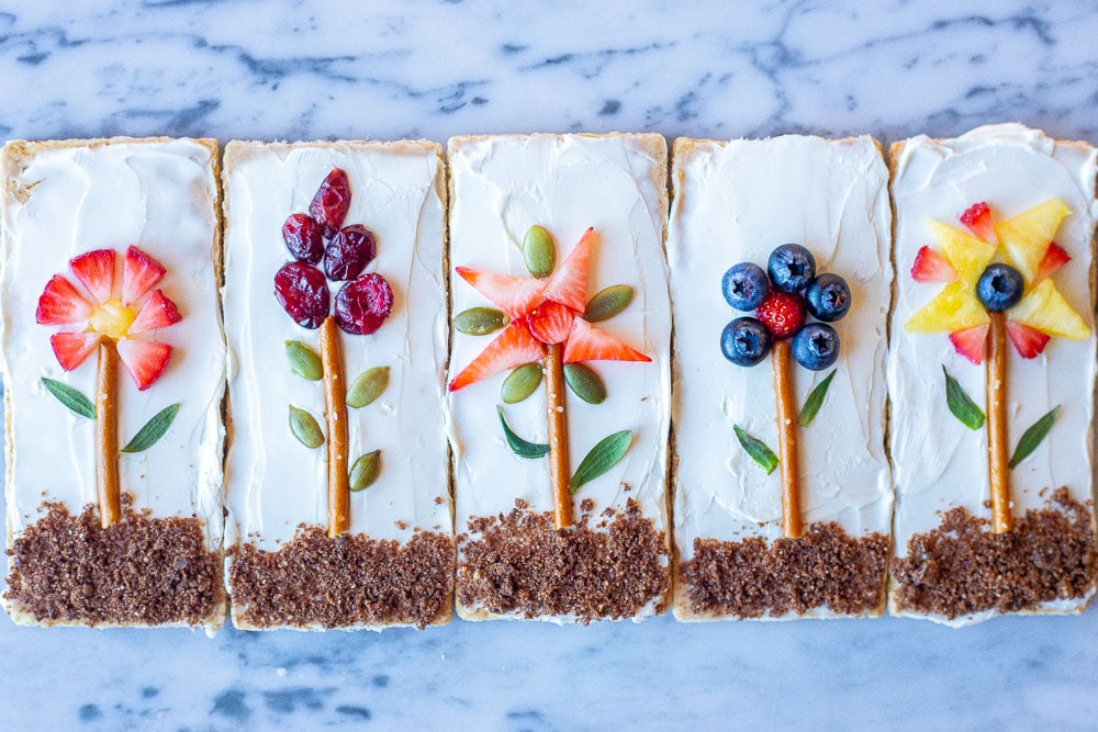 Flower garden graham crackers next to each other on a marble table