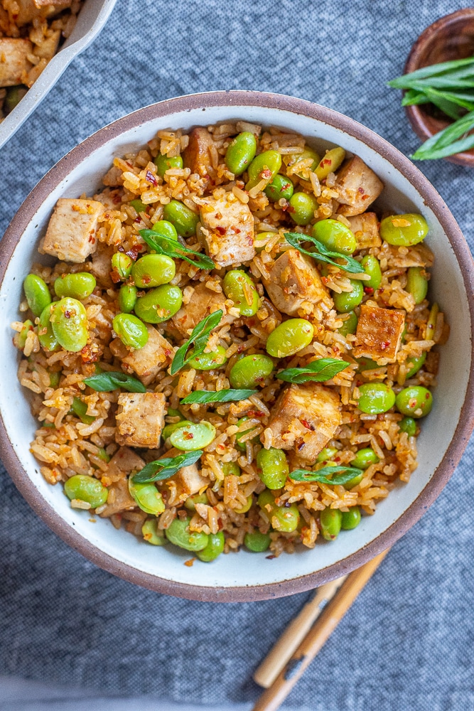 big bowl of spicy edamame stir fry with tofu and green onion