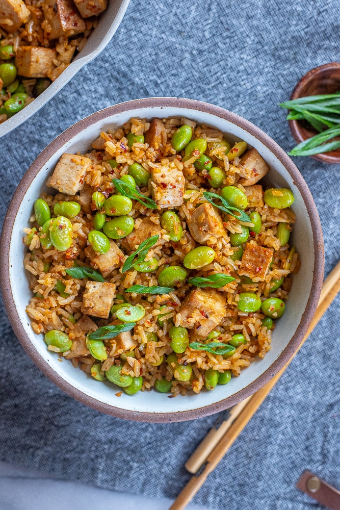 edamame stir fry in a bowl with chili crunch and tofu