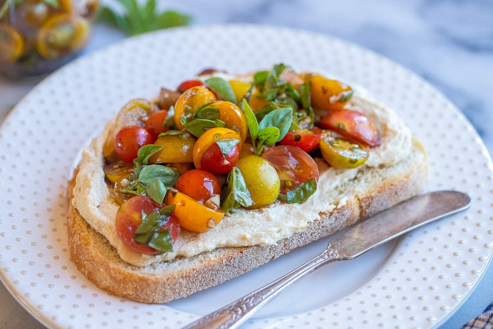 close up of hummus toast with bruschetta recipe