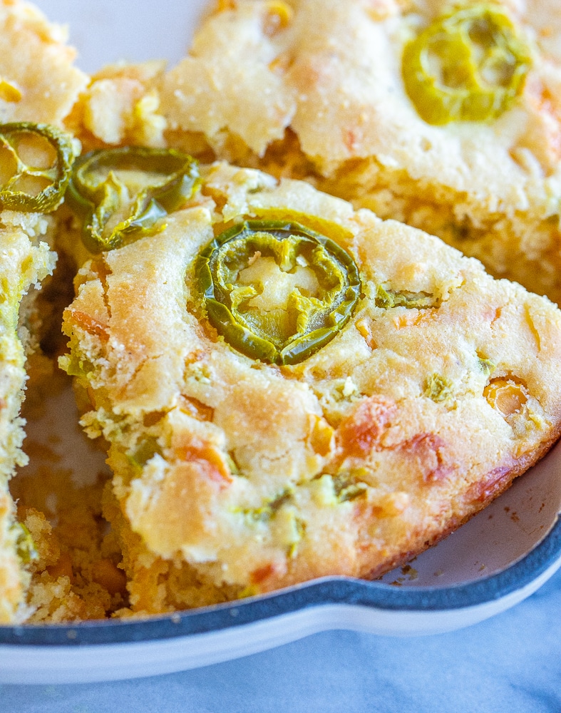 close up of a big slice of sharp cheddar cornbread