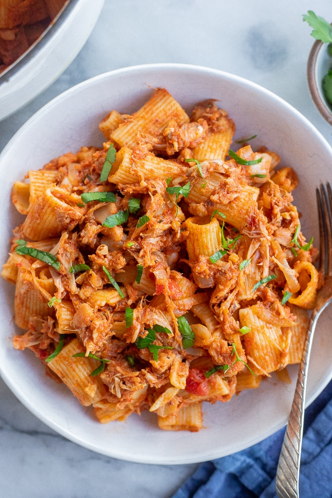 bowl of smoky jackfruit rigatoni with parsley