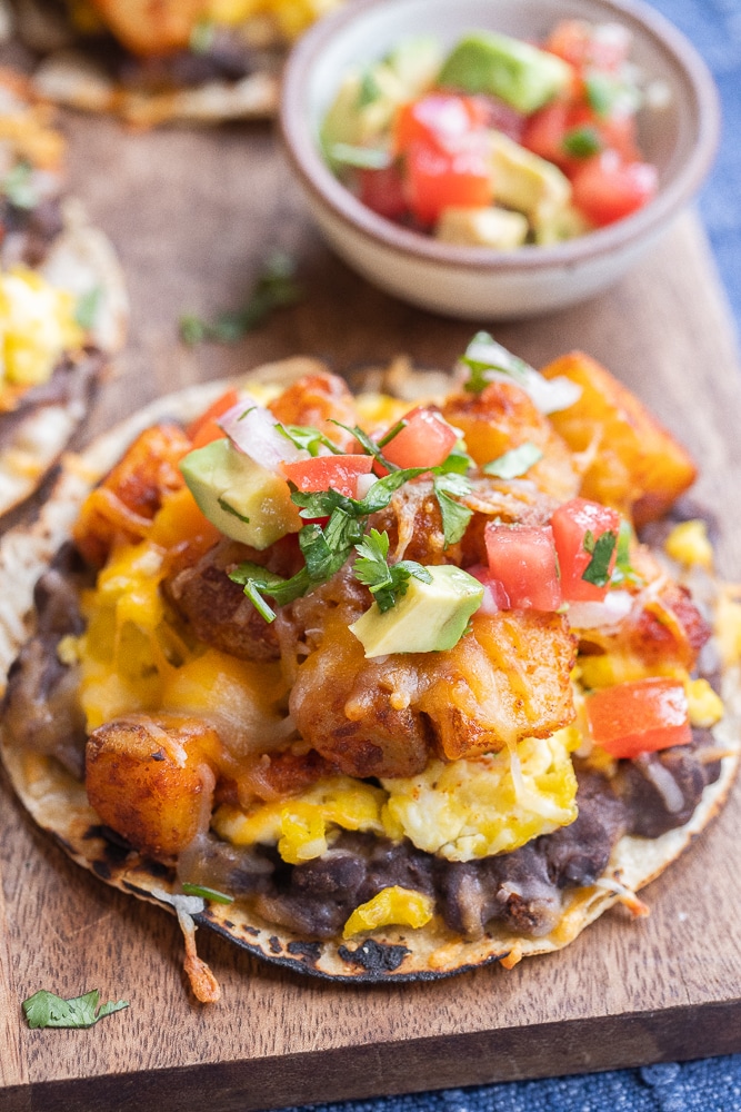 close up of a potato egg and cheese breakfast taco with pico de Gallo