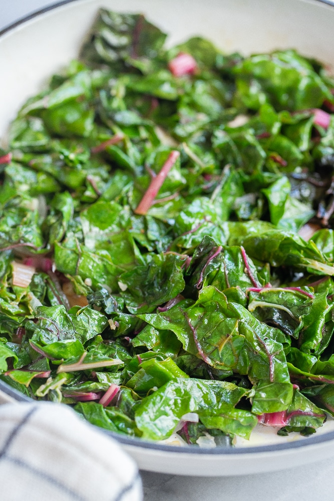 close up of sauteed swiss chard in a pan