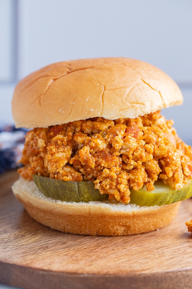 close up of a vegetarian pumpkin sloppy joe with pickles
