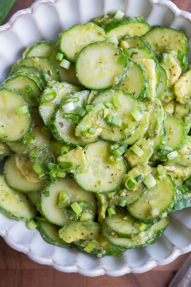 close up of a bowl of homemade avocado cucumber salad