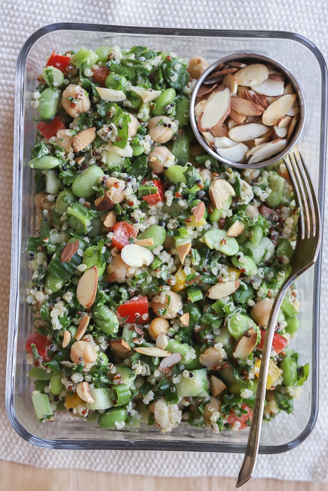 close up of a chickpea edamame salad in a meal prep container