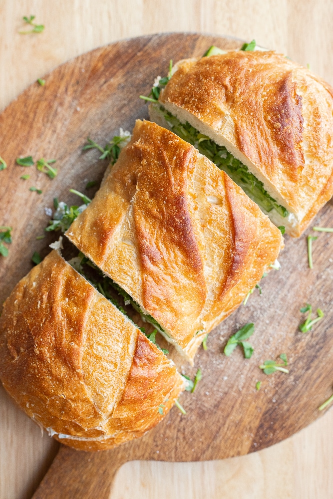 cream cheese cucumber sandwich cut into three slices