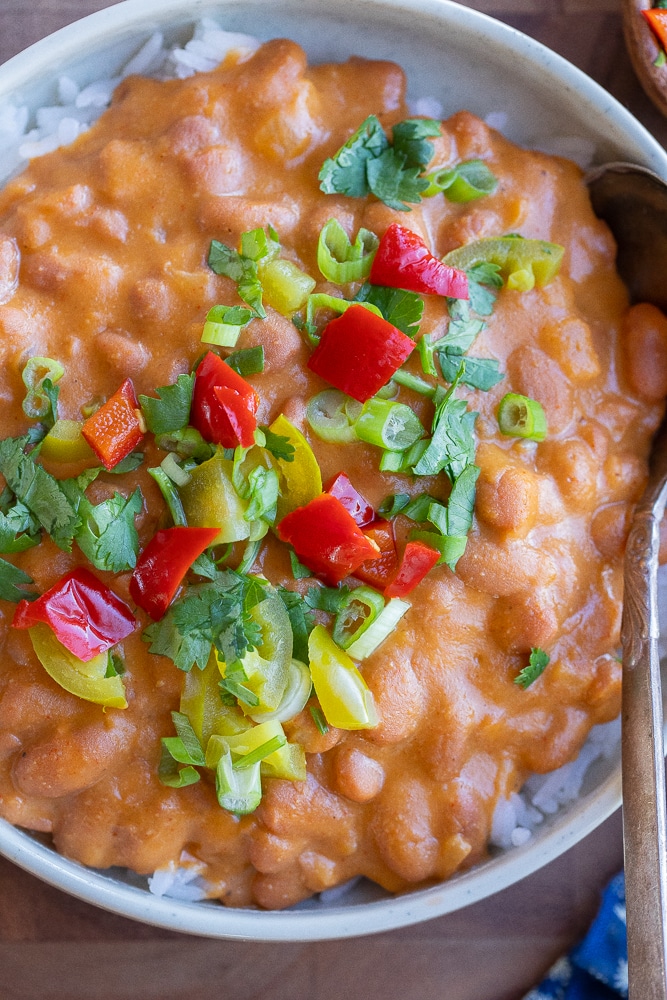 close up of cheesy beans with toppings