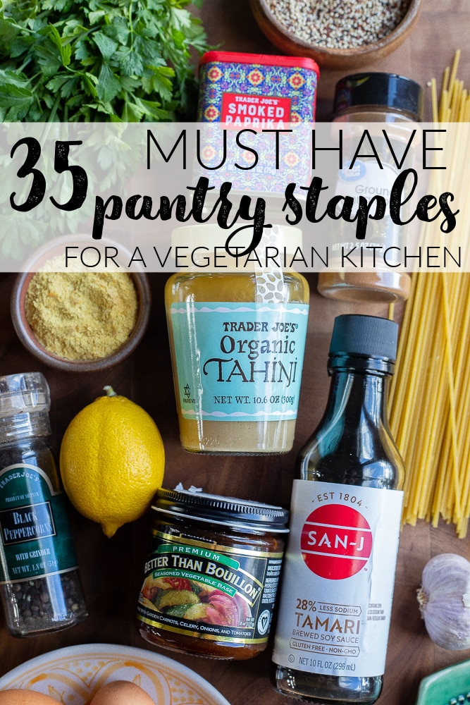 vegetarian pantry staples on a cutting board with text over it
