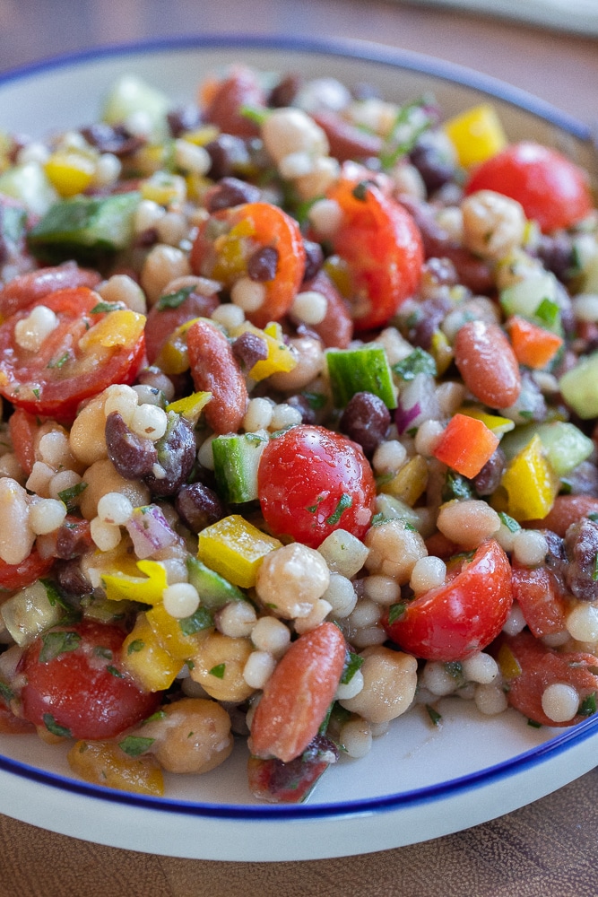 plate full of four bean couscous salad