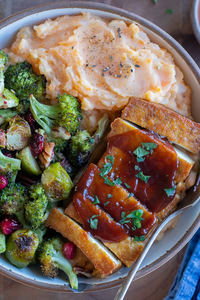 close up of this cozy baked tofu and vegetable bowls
