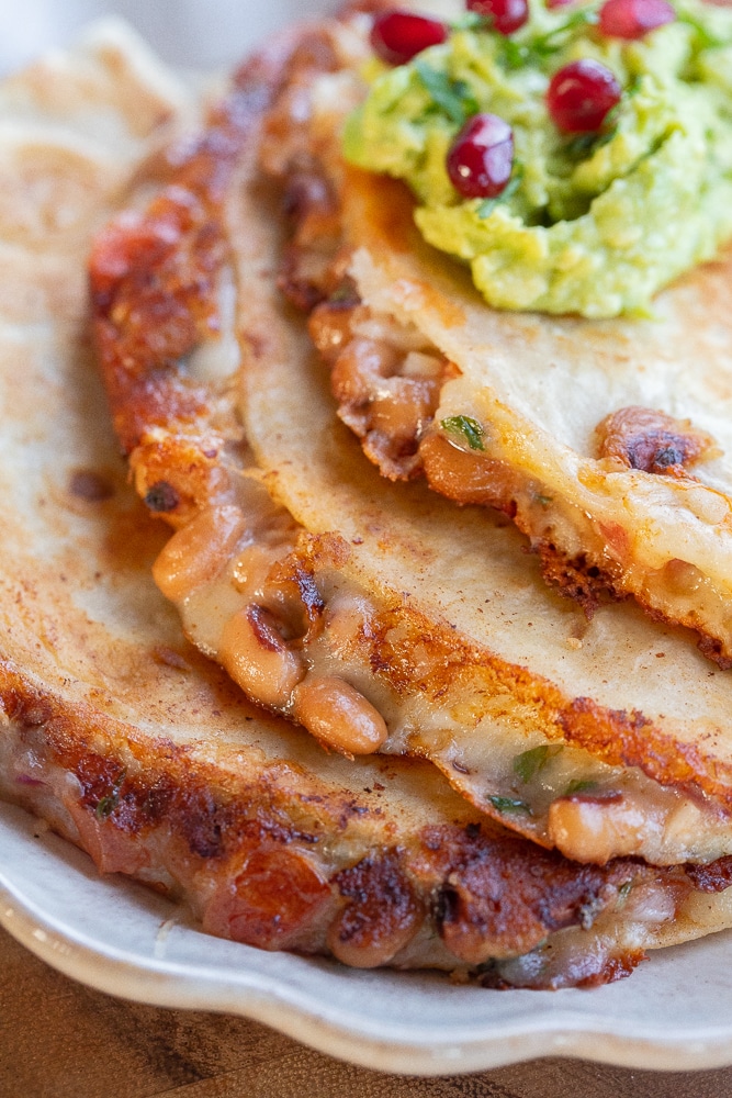 stacked quesadillas on a plate