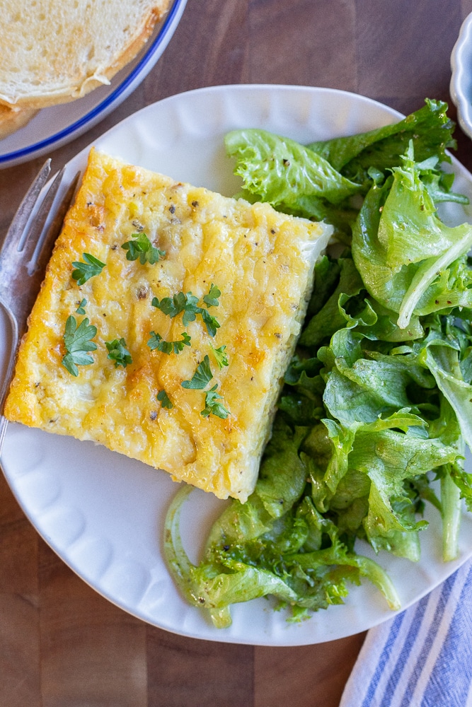 breakfast table with cauliflower egg bake and salad